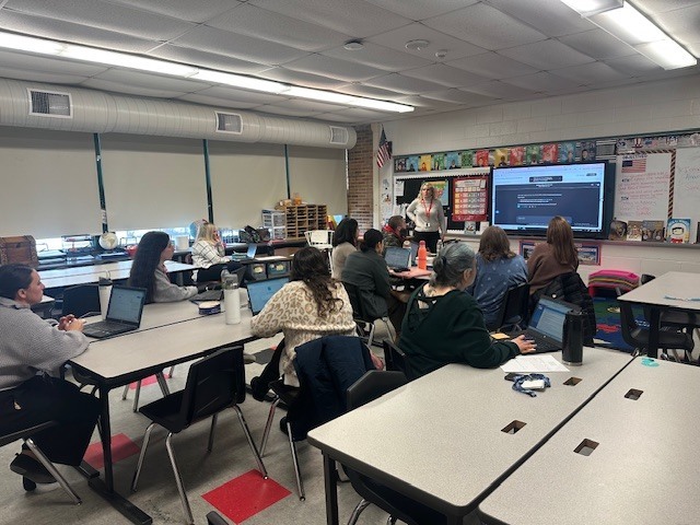 Mrs. Portee shows her fellow teachers what she has discovered about AI in the classroom!