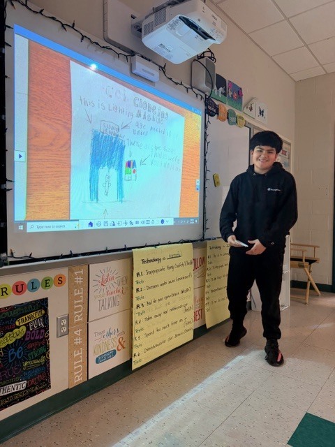 student presenting their invention