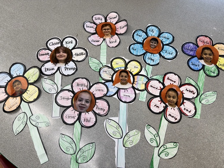 Students created "adjective flowers" to describe themselves, and did an amazing job using descriptive words!