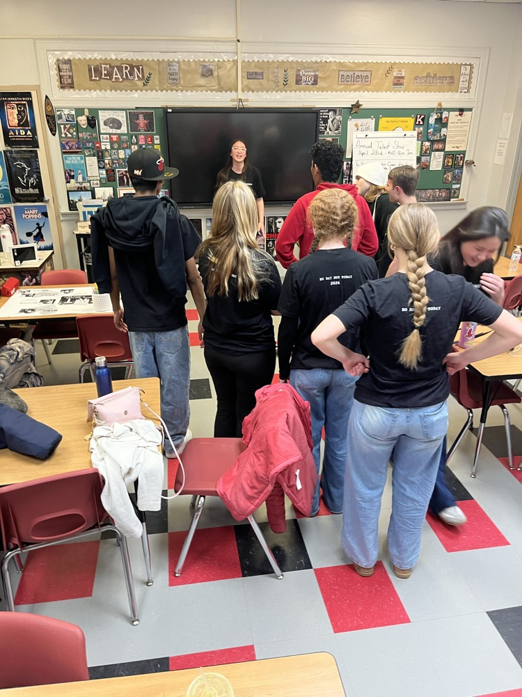 Emily Yang leading vocal warm ups