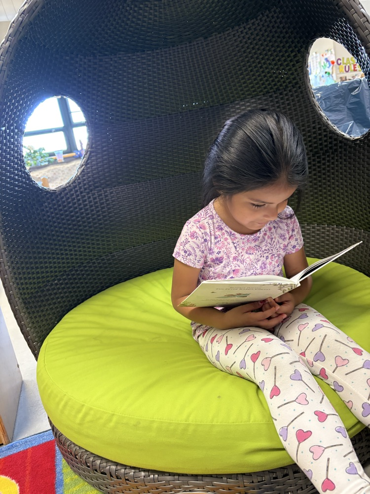 Just hanging out reading my book during work time!