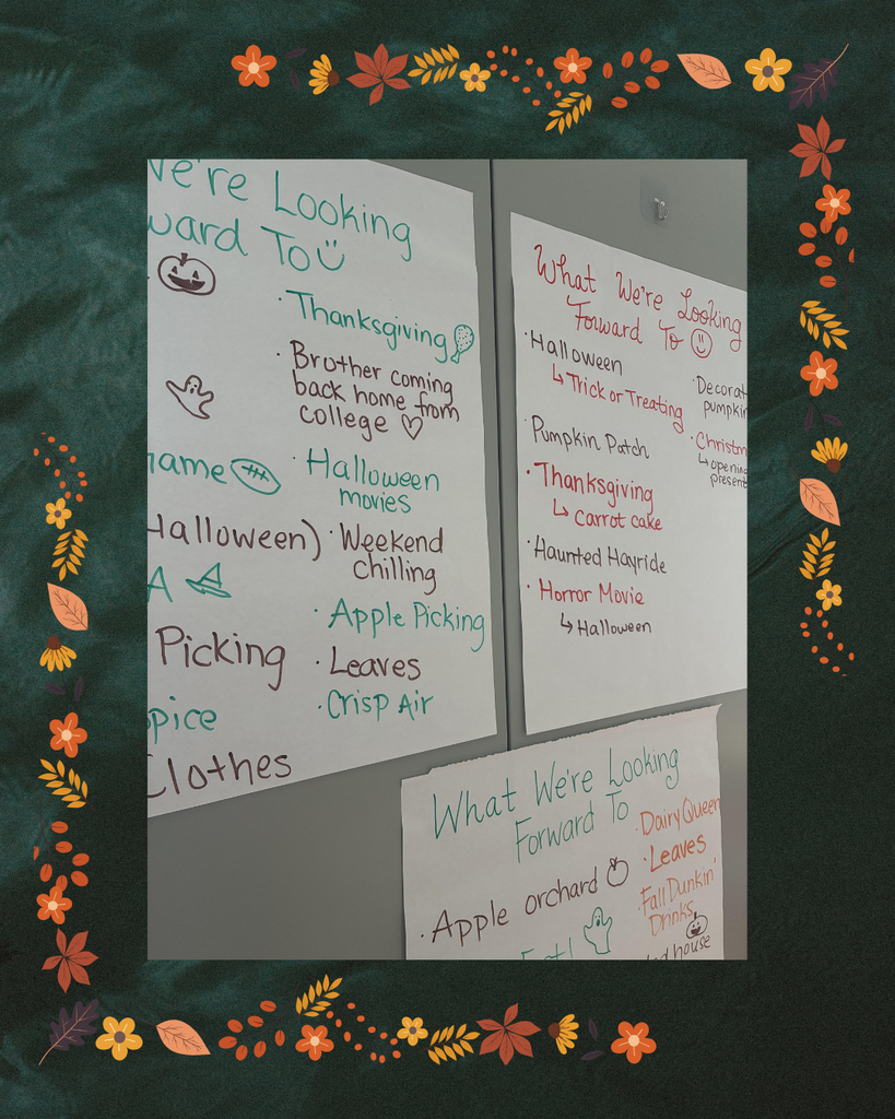 Three poster papers with the title "What We're Looking Forward To" with various student answers