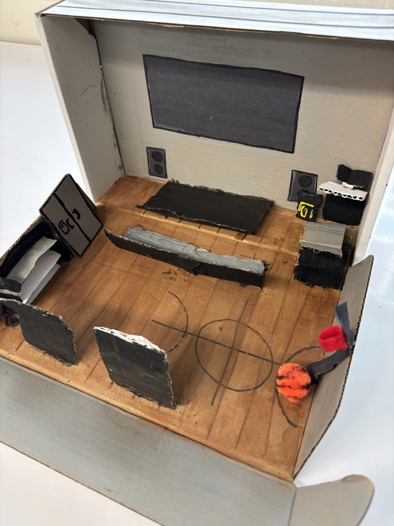 cardboard box room wtih a basketball court floor