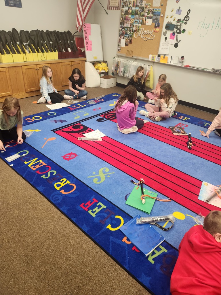3rd graders tackle some rhythm patterns with partners.