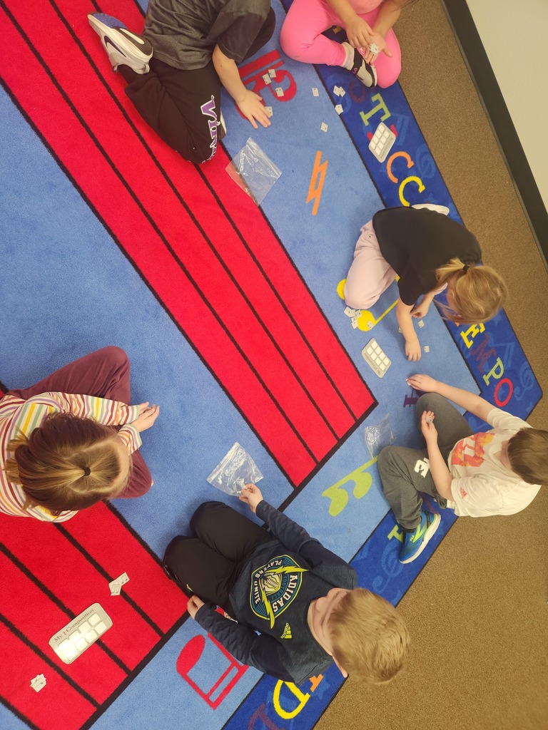 1st graders focusing in on their rhythm work.