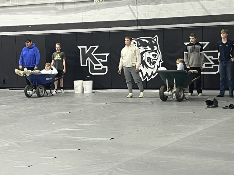 Wheelbarrow racers patiently waiting to show their speed!