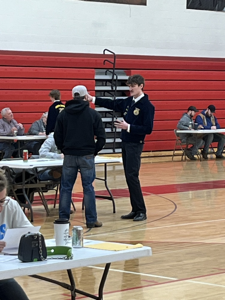 Gage selling coyote call to a local rancher.