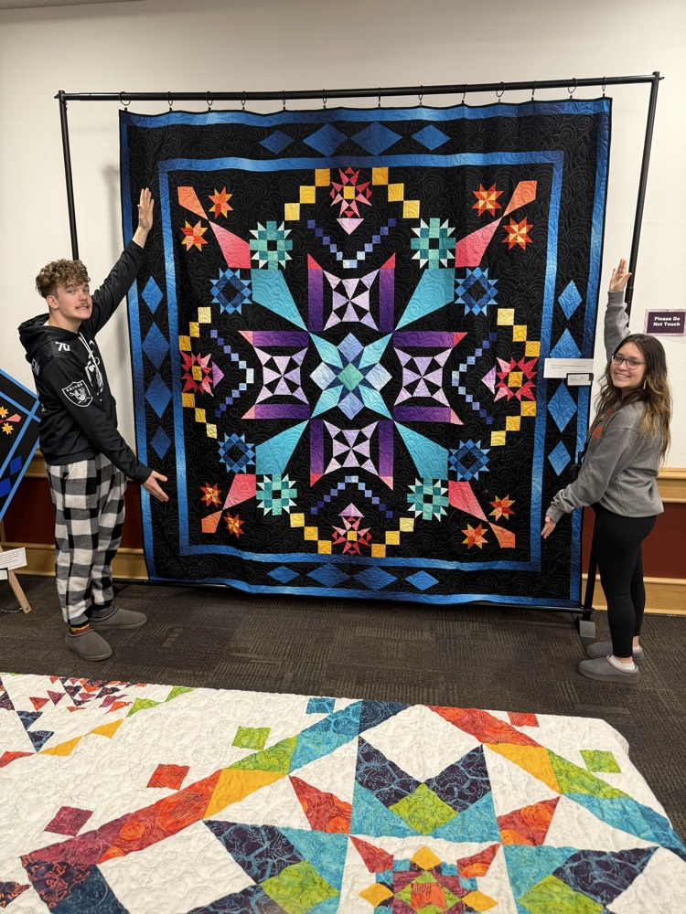 student with sewing project 