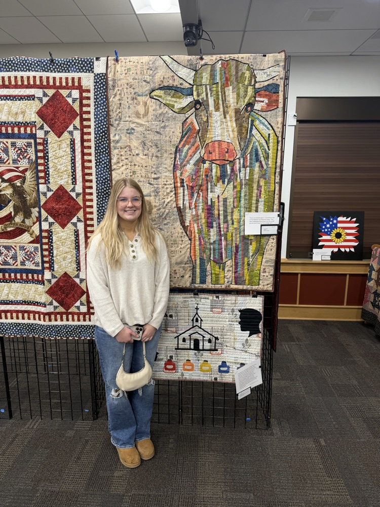 student with sewing project 