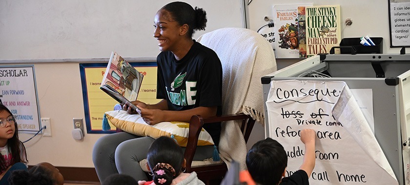 EHS student reads at Reeces Creek ES