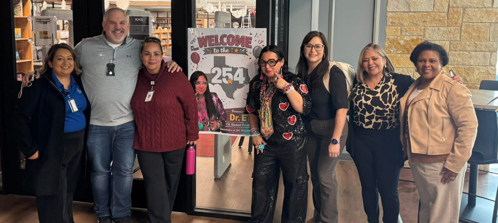 group of people smiling at the camera 