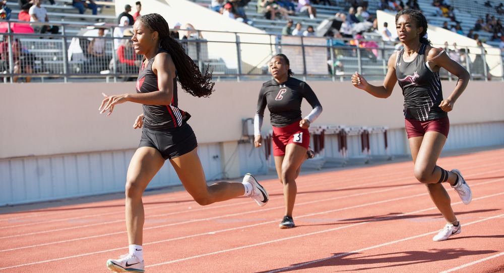 KISD athletes running at KISD Relays