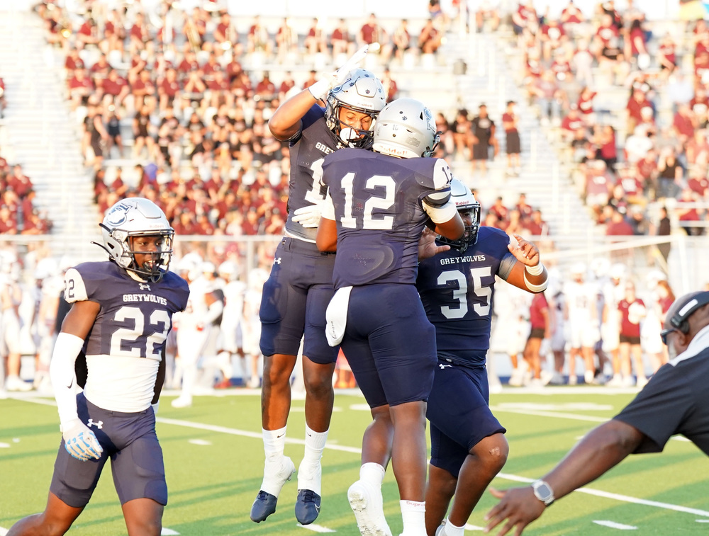 SHS football players celebrate