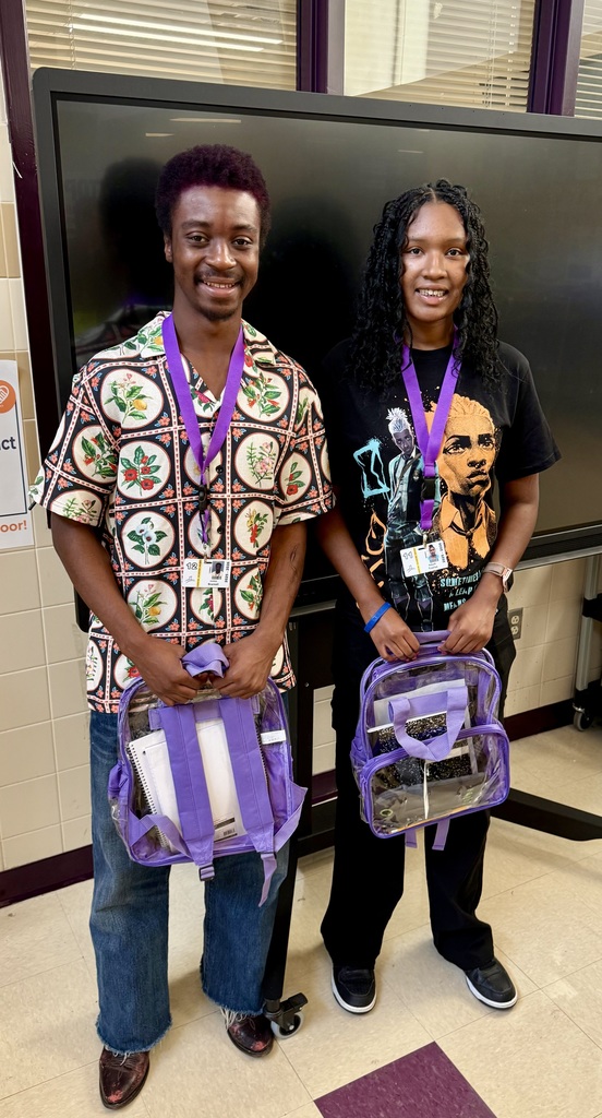 Two students with backpacks
