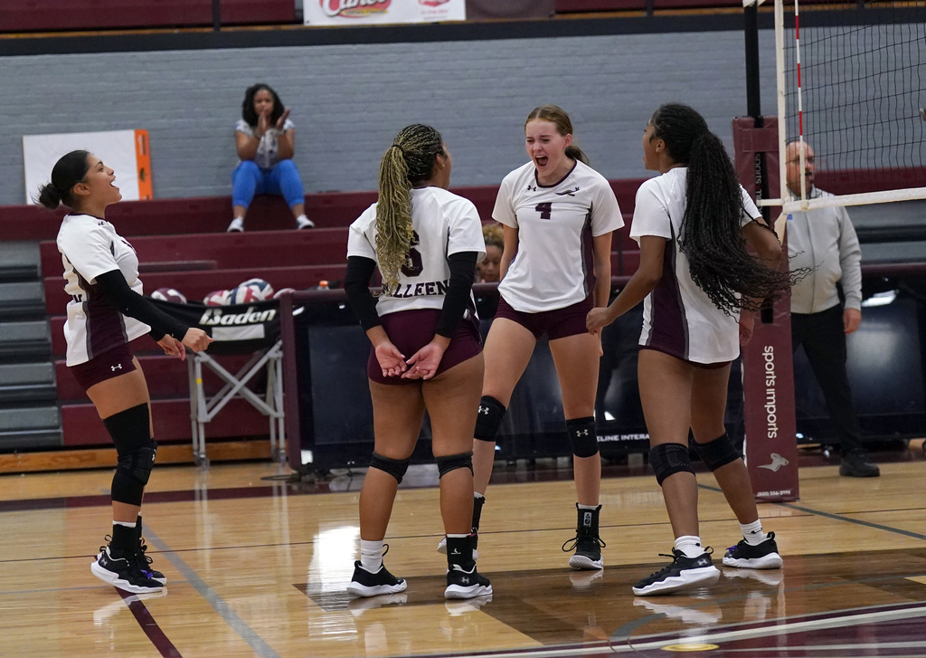 KHS volleyball celebrates a point