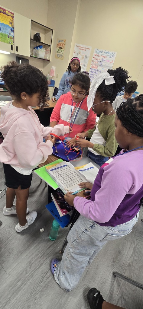 students testing electricity