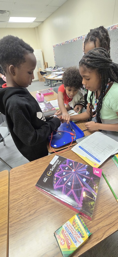 students testing electricity
