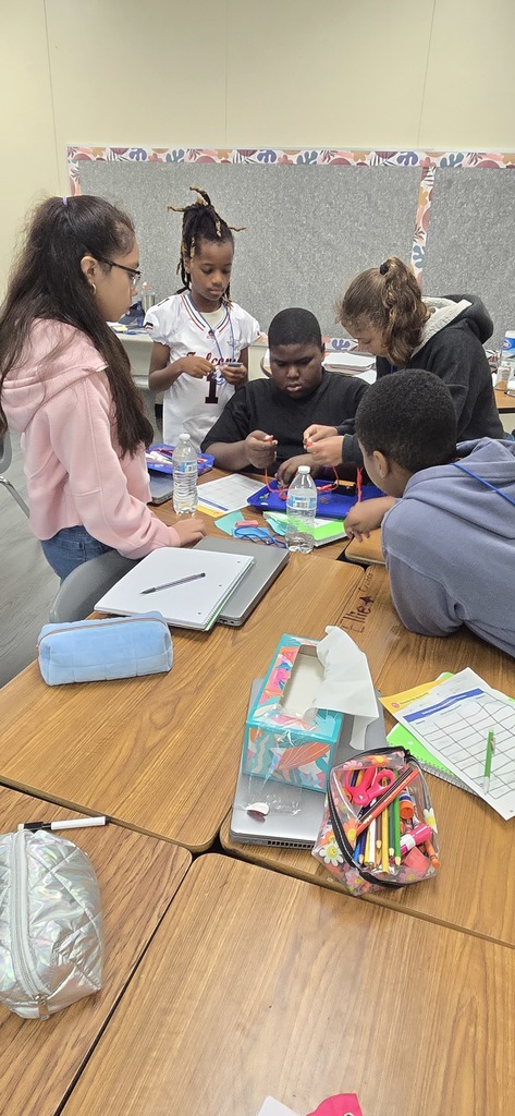 students testing electricity