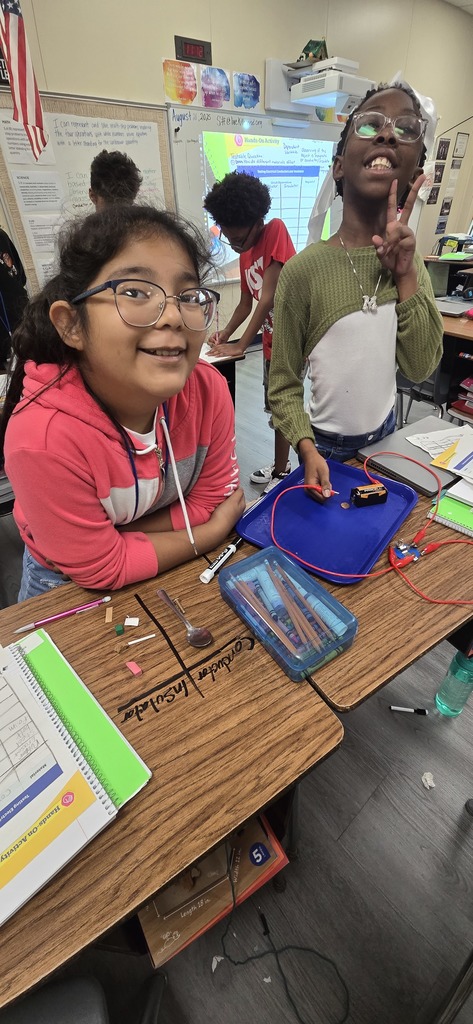 students testing electricity