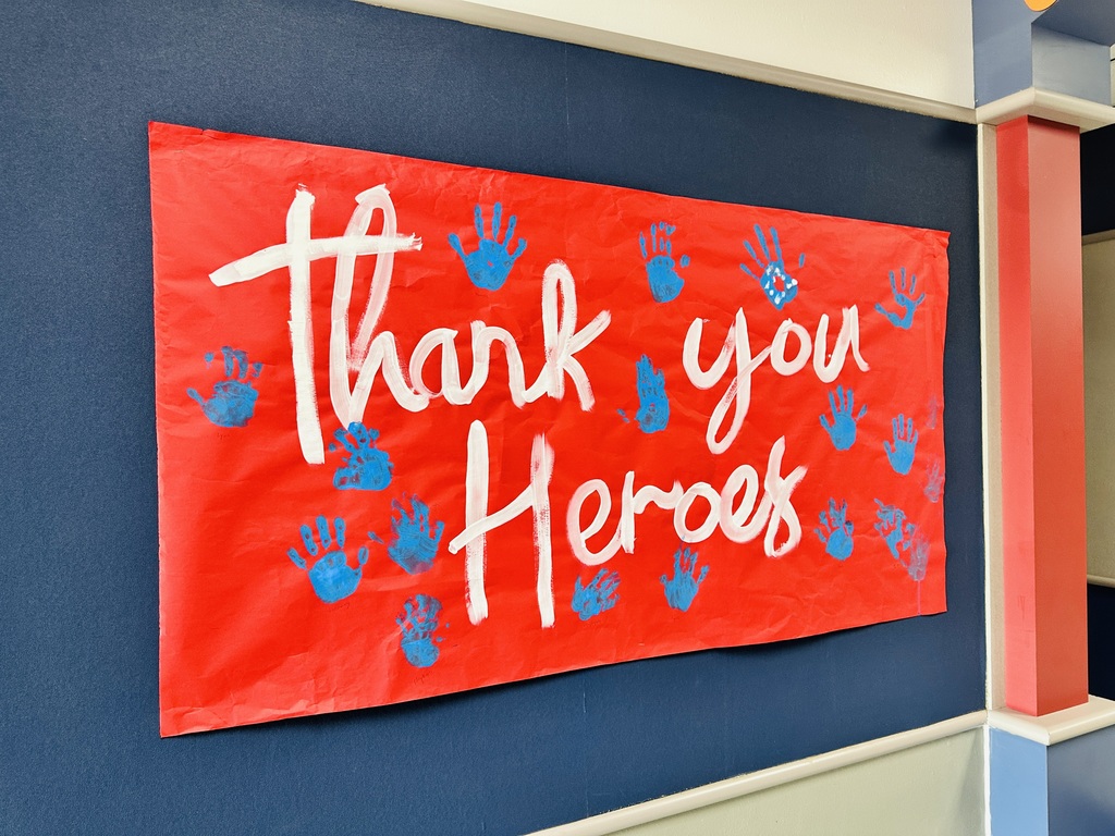 banner saying "Thank you Heroes"