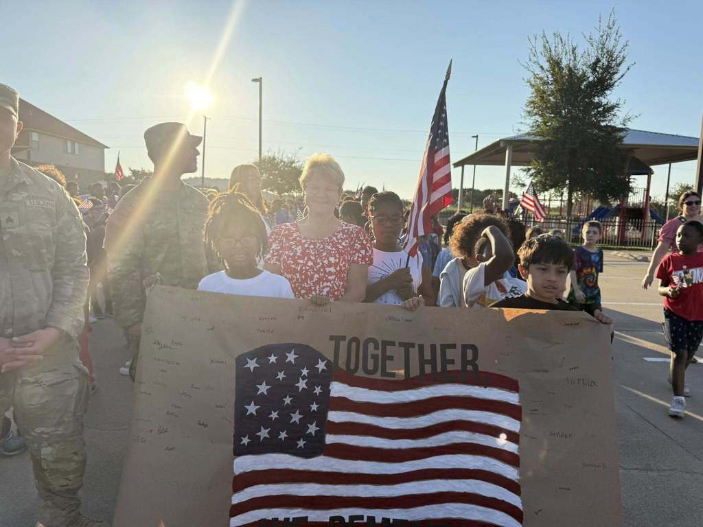 students holding banner