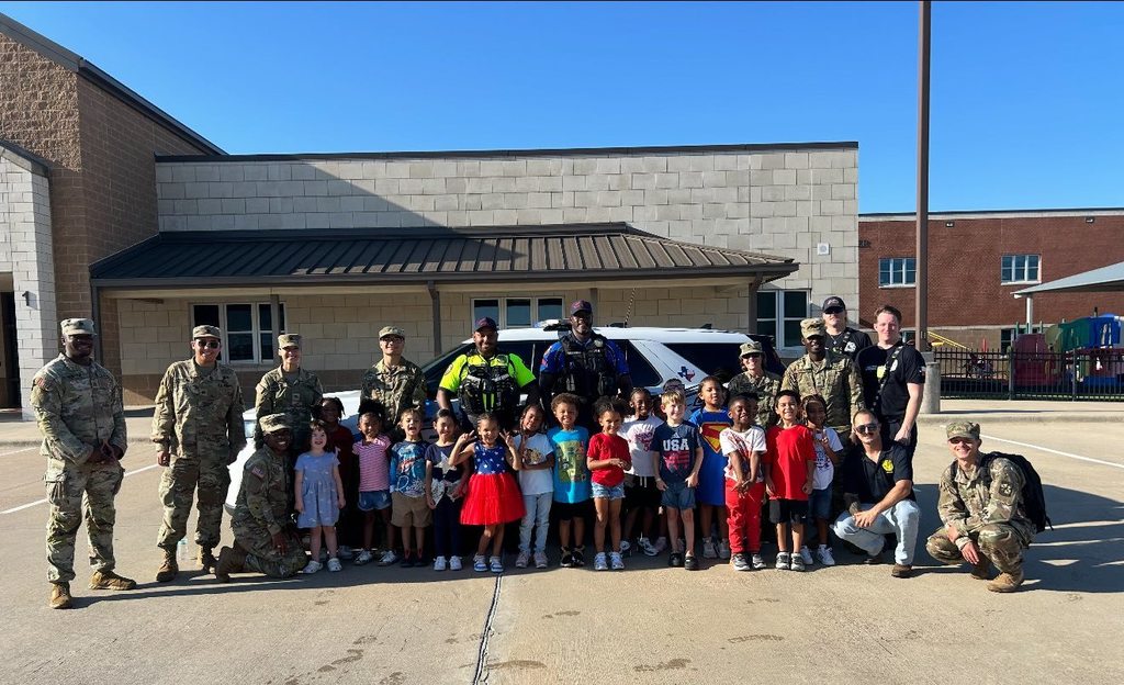 students with soldiers and first responders