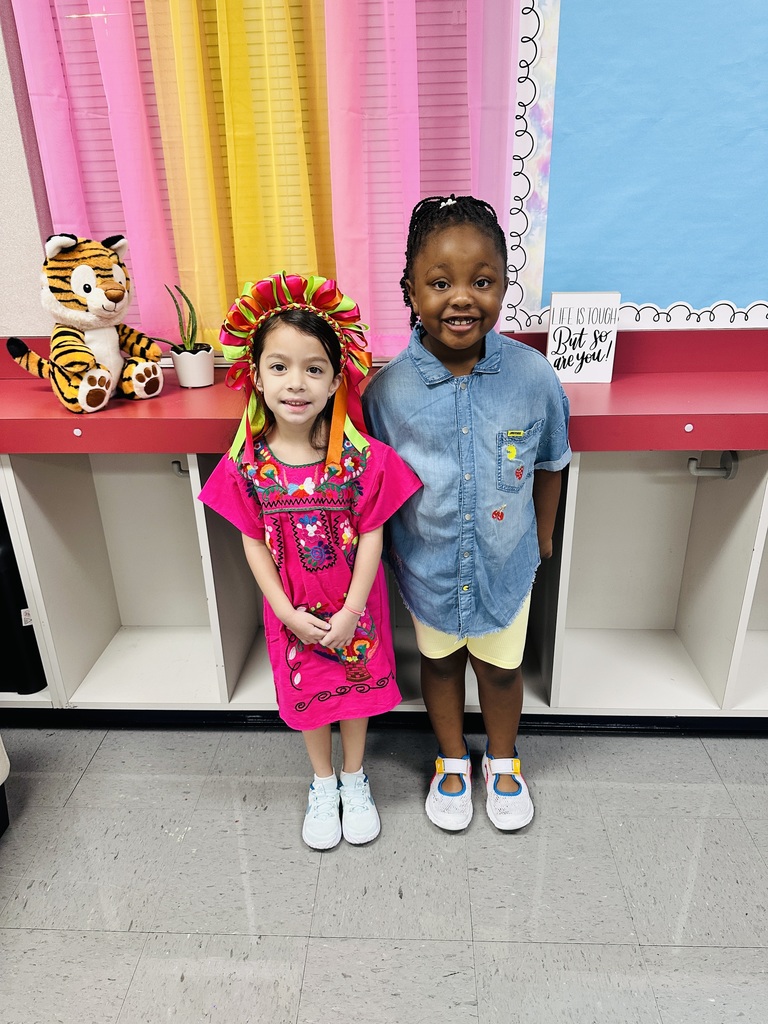 2 girls posing for a picture