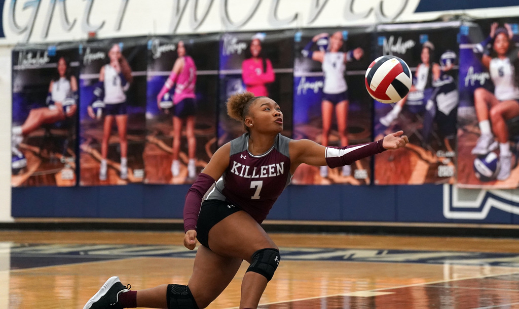 KHS volleyball player makes a dig