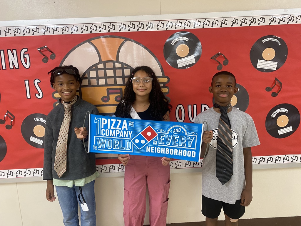 Children with a pizza flyer