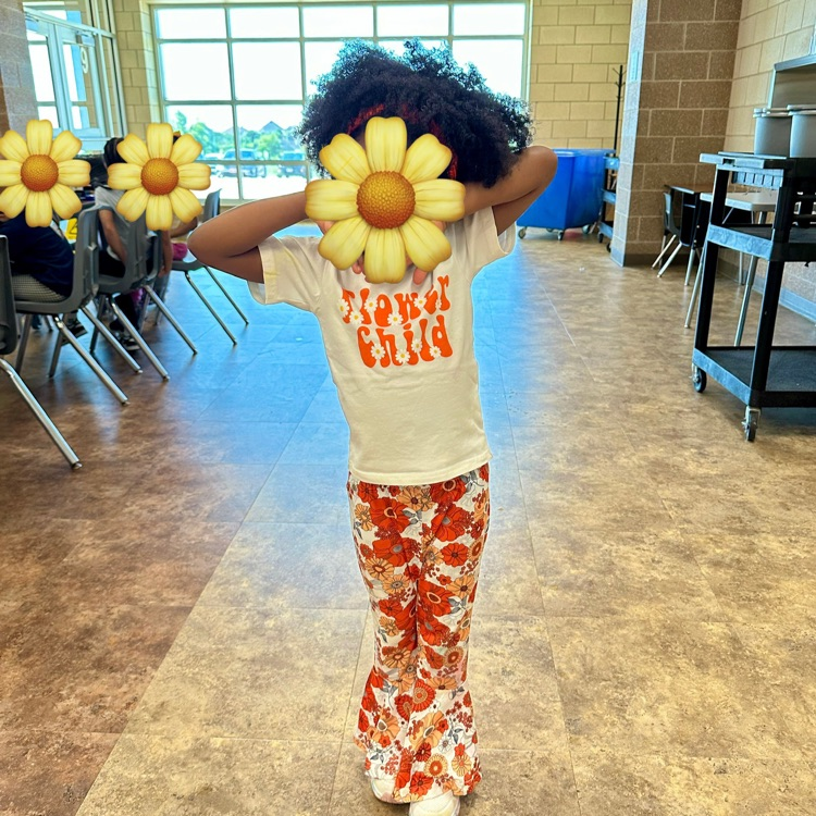 students dressed in 60s era