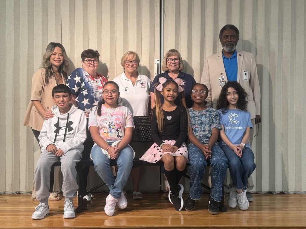 people standing with a bench