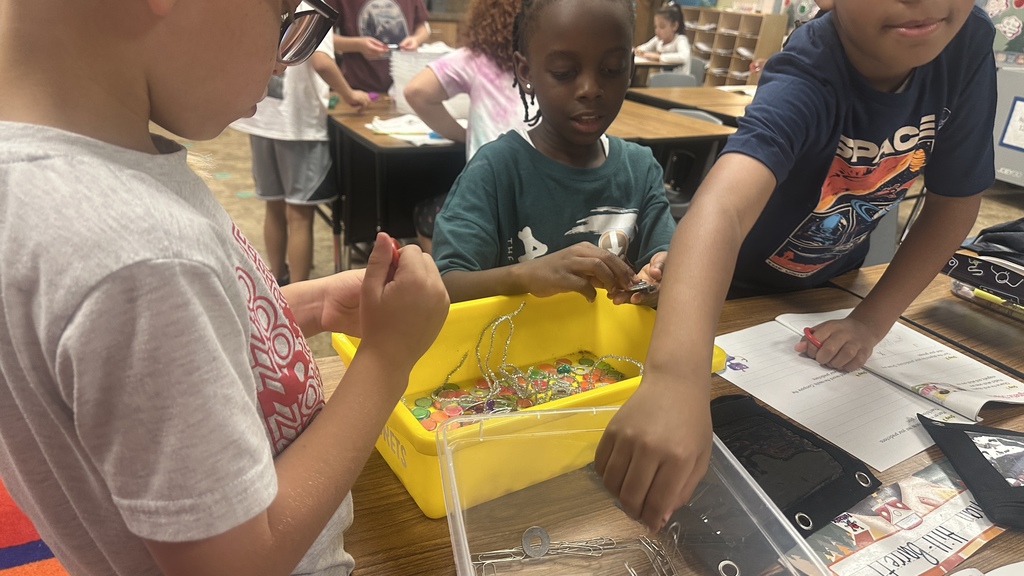 students working with magnets and objects