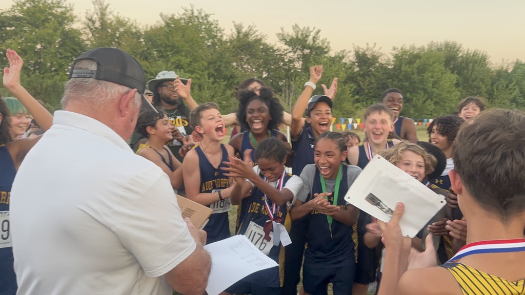 Excited cross country winners