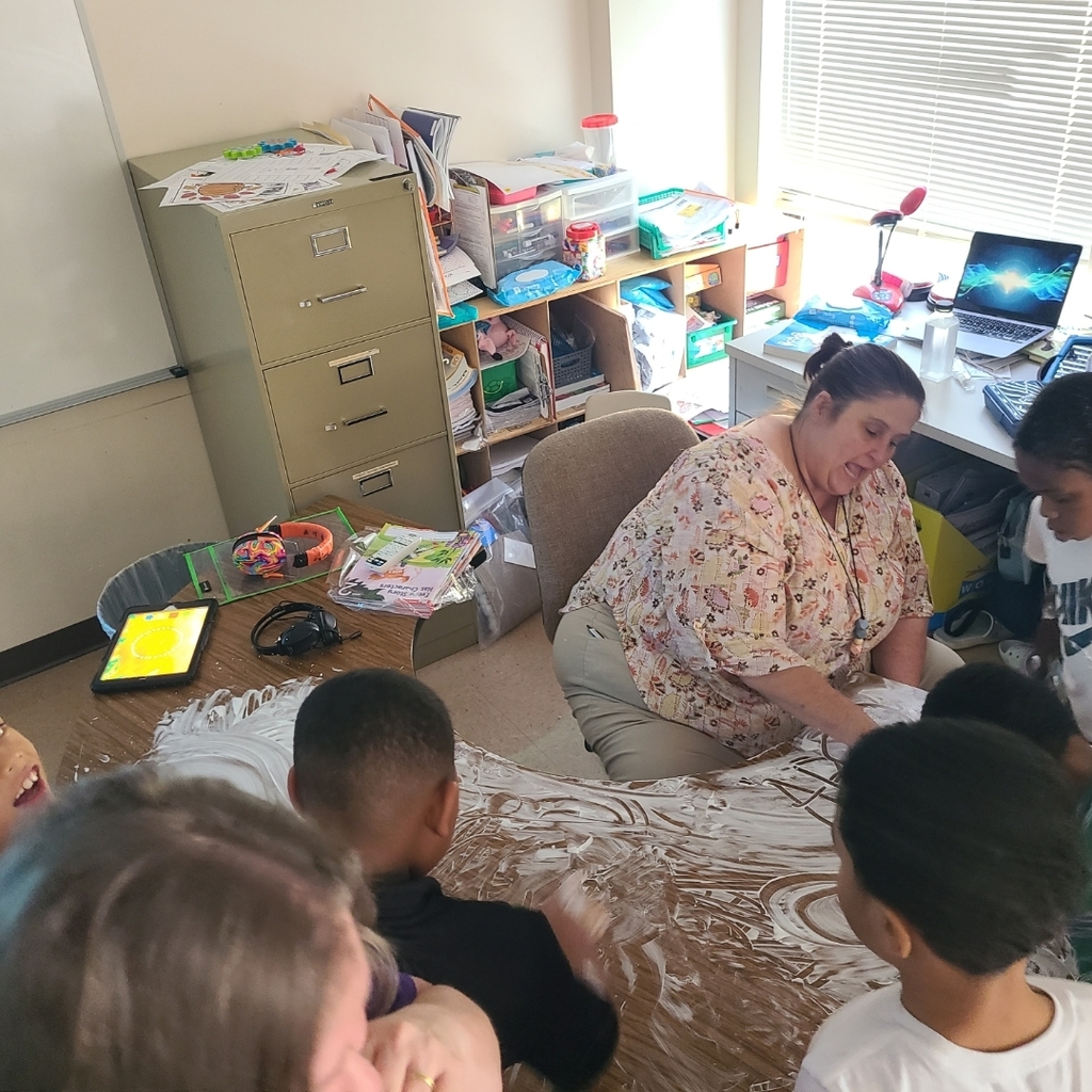 Teacher with Students