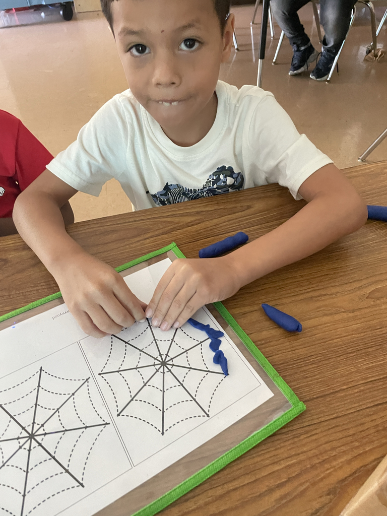 Student with playdough