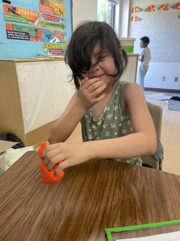 Student with playdough