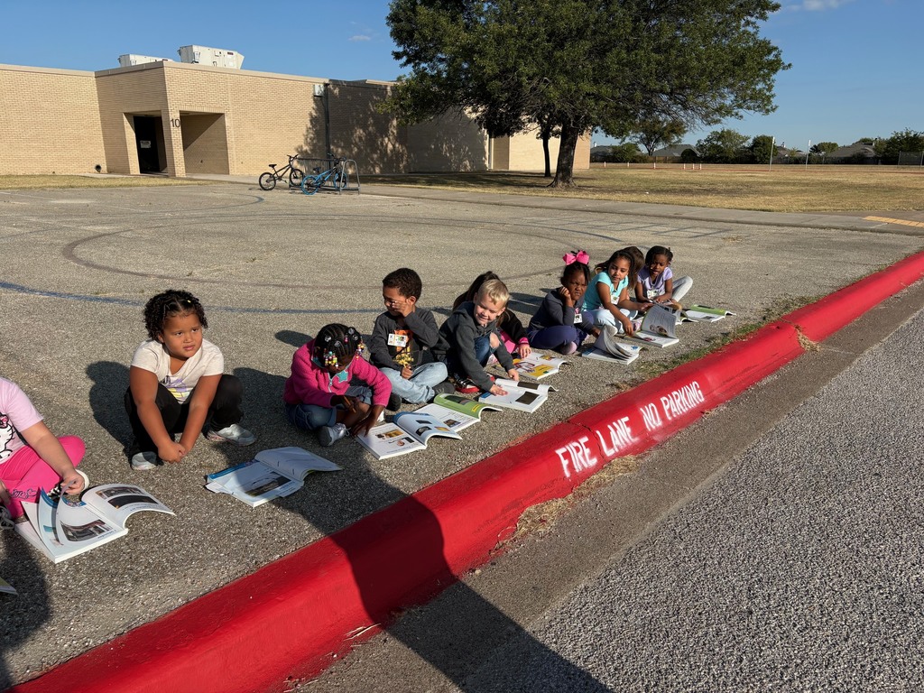 students outside observing sun