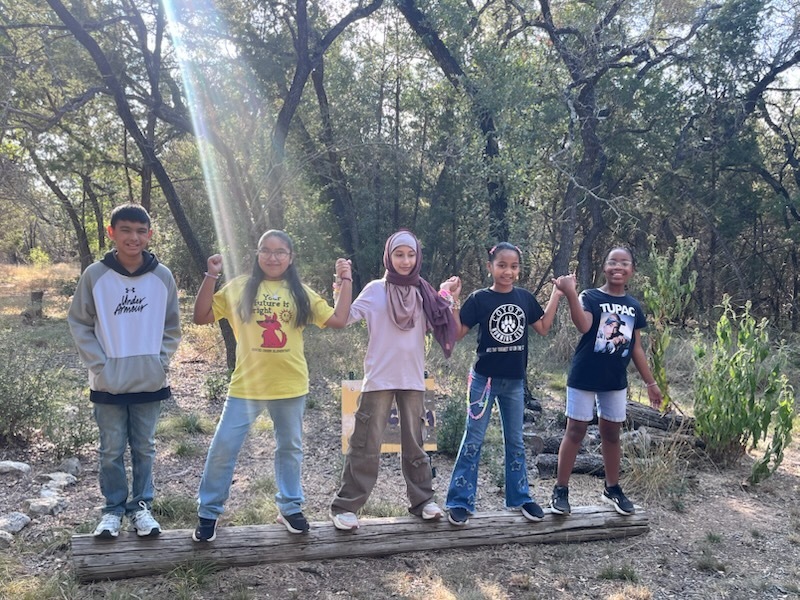 Kids completing obstacle course