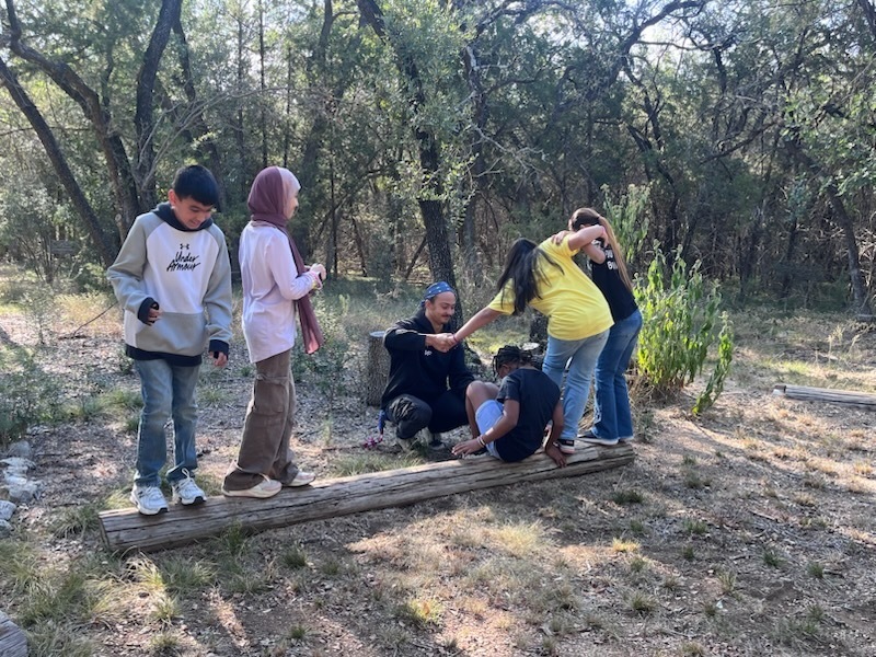 Kids completing obstacle course