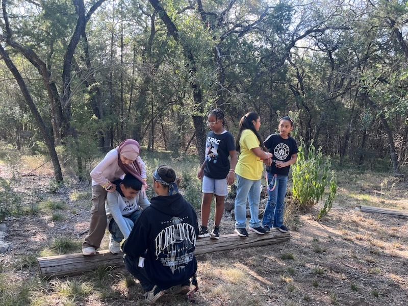 Kids completing obstacle course