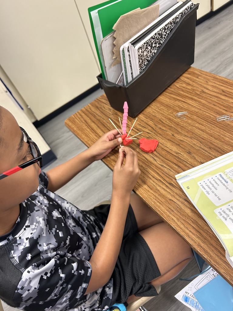 students using clay to create new objects