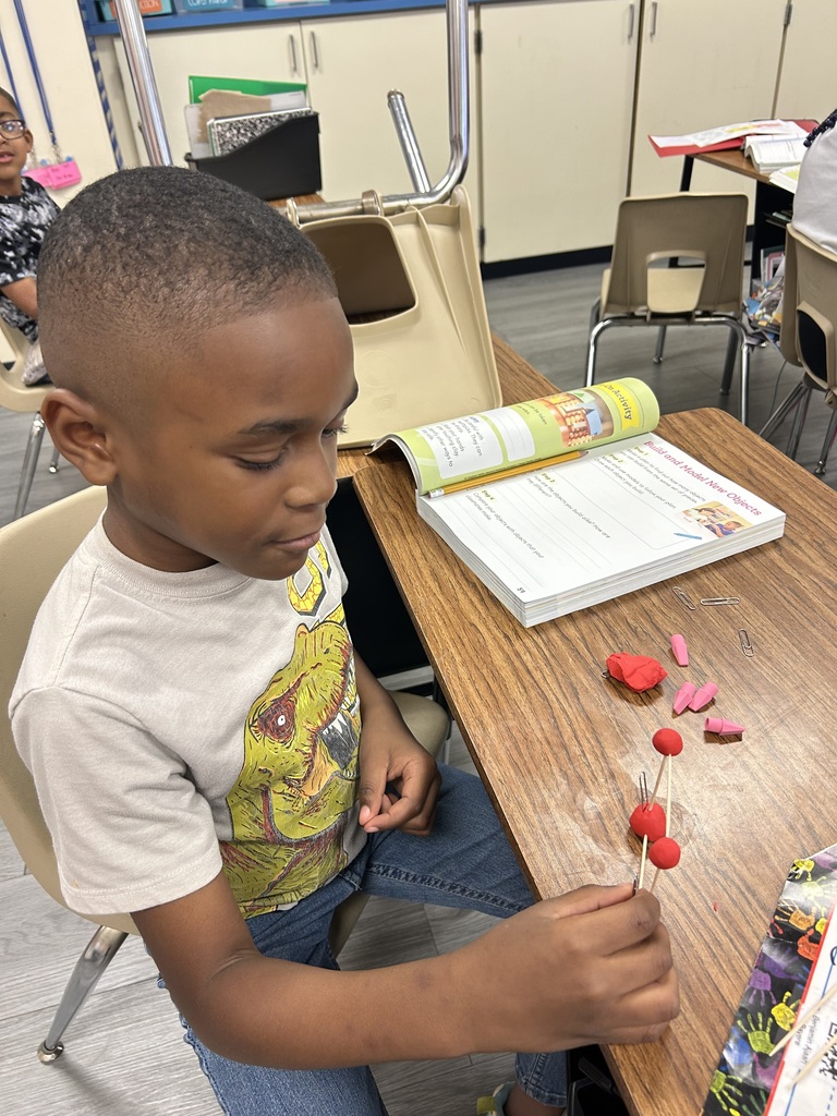 students using clay to create new objects