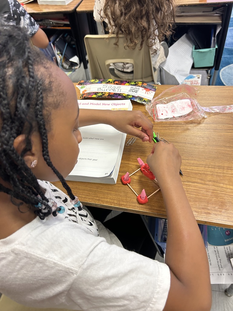 students using clay to create new objects