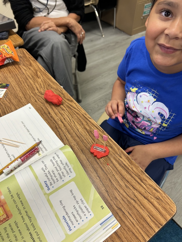 students using clay to create new objects