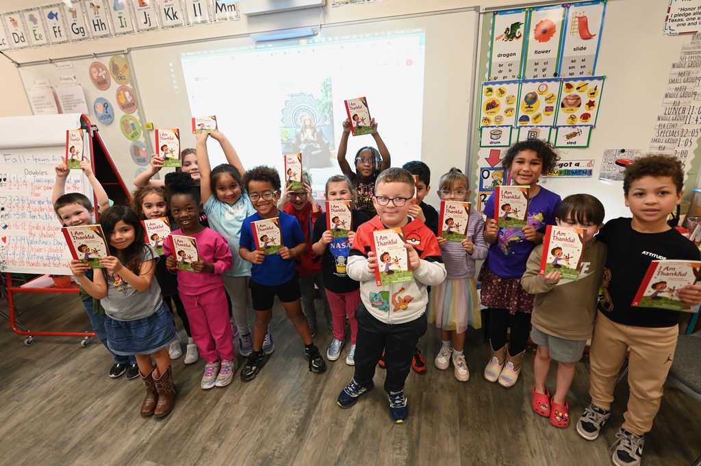 Book donation to Clarke ES