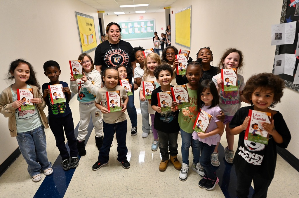 Book donation to Clarke ES