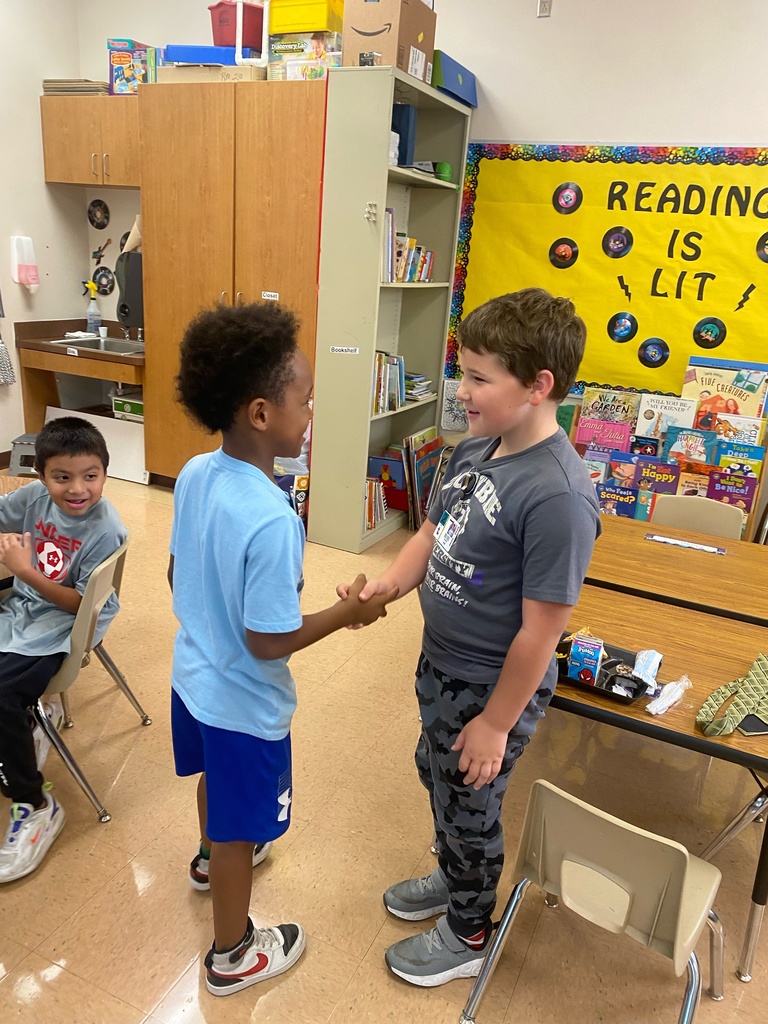 Students shaking hands