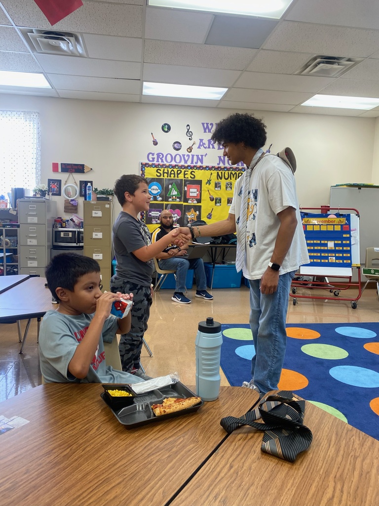 Students shaking hands