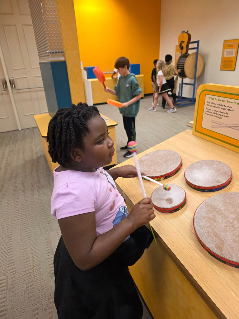 students exploring museum