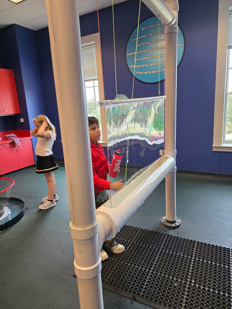 students exploring museum